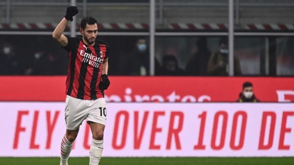 The Italian head coach has given an update on the Turkey international's contract situation at San Siro (Photo: AFP)