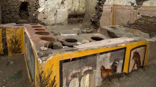 The newly unearthed thermopolium, a sort of ancient 'fast food' counter, in Pompeii. (Twitter)