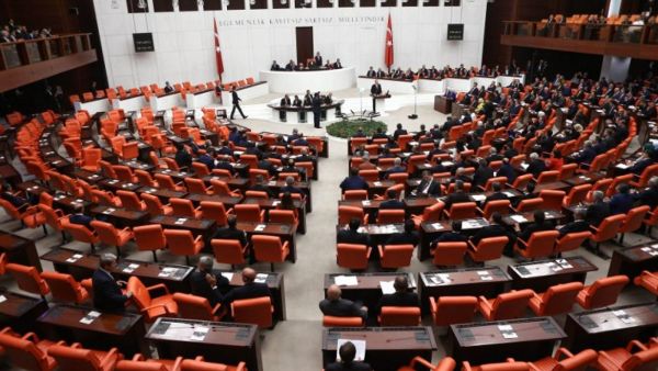 Turkish MPs and ministers attend a debate in Ankara on 1 October (AFP)