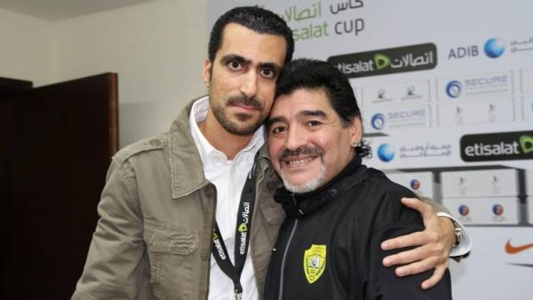 Tariq Al Sharabi poses with Diego Maradona. (Supplied photo)