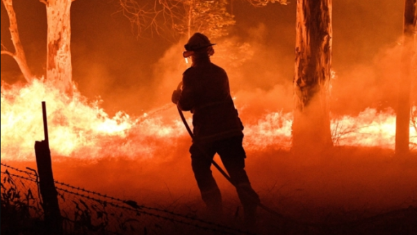 Australia should expect a longer and more extreme bushfire season as carbon emissions create a hotter, drier climate, a government agency warned on Friday [File: Saeed Khan/AFP]