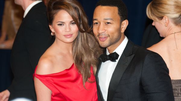 John Legend and Chrissy Teigen arrive at the White House Correspondents Dinner. (shutterstock)