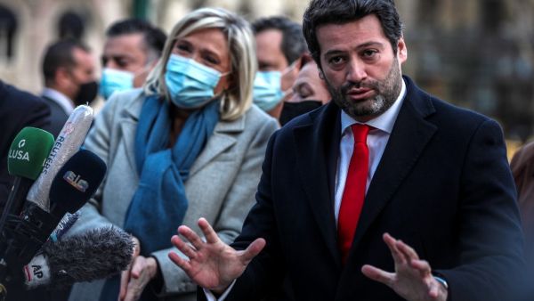 In this file photo taken on January 08, 2021 President of French far-right party Rassemblement National (RN), Marine Le Pen (L) and the leader of Portuguese far-right party Chega, Andre Ventura hold a joint press conference at the Monument to the Fallen in the Great War in Lisbon. The first round of the presidential election will be held on January 24, 2021. The head of the anti-establishment party Chega, MP Andre Ventura, aims to bolster the inroads this new right-wing populist party has made since it ente
