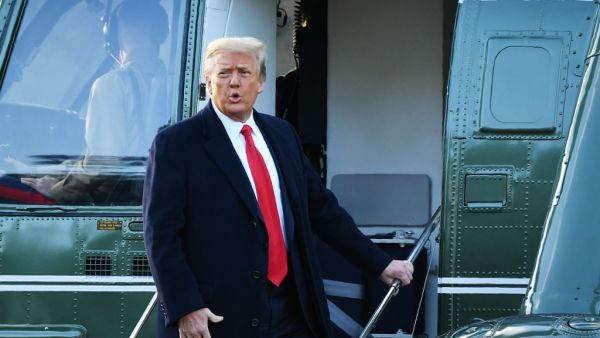 In this file photo taken on January 20, 2021 outgoing US President Donald Trump boards Marine One at the White House in Washington, DC. Several of former US president Donald Trump's impeachment lawyers have left his team a little over a week before his trial, US media reported on January 30, 2021. CNN cited unnamed sources as saying that five lawyers -- including two who were thought to be leading the team -- had parted ways with the Republican billionaire after disagreeing over his legal strategy.  MANDEL 