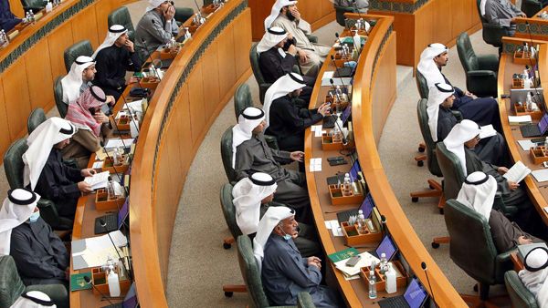 Kuwaiti MPs attend a parliament session at the National Assembly in Kuwait City, on January 5, 2021. (AFP)
