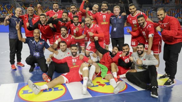 Bahrain's players pose for a photo as they celebrate after winning the 2021 World Men's Handball Championship match between Group D teams Bahrain and DR Congo at the Cairo Stadium Sports Hall in the Egyptian capital on Jan 19, 2021. (Photo: AFP)
