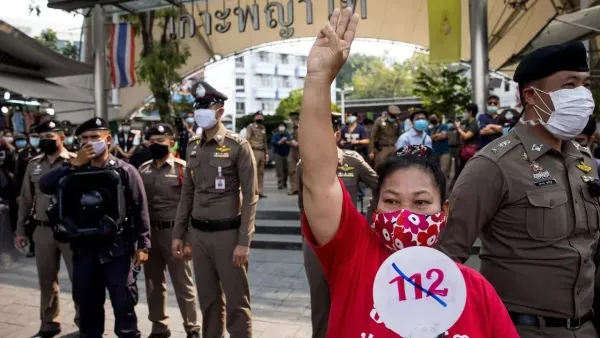 A woman protesting against section 112 of Thailand's penal code, which deals with lese majeste at Victory Monument in Bangkok on January 16 Jack TAYLOR AFP/File