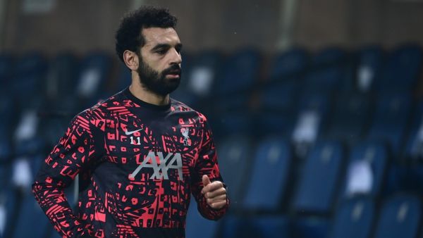 The Brazilian is adamant that his team-mate remains in good spirits at Anfield despite speculation over his future (Photo: AFP)