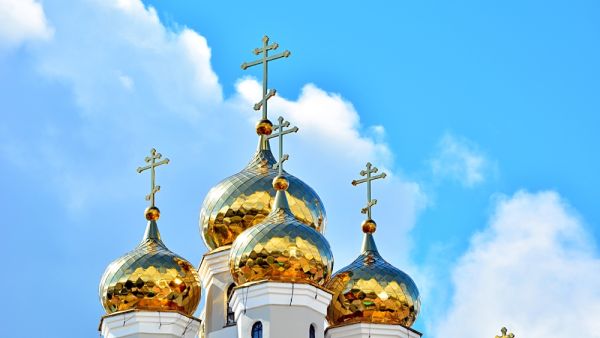 Orthodox crosses on gold domes  (Shutterstock)
