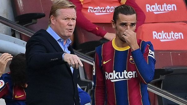 أنتوان غريزمان (يمين) ورونالد كومان