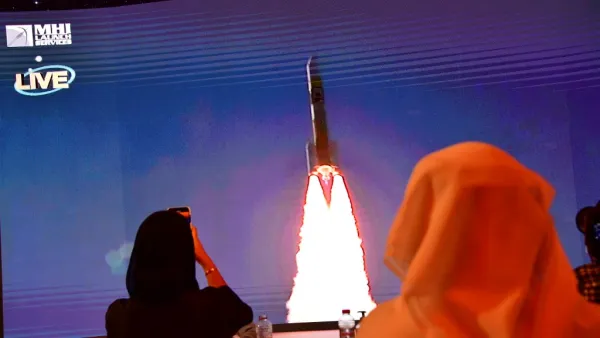 This file photo taken on July 19, 2020, shows a screen broadcasting the launch of the "Hope" Mars probe at the Mohammed Bin Rashid Space Centre in Dubai. The first Arab interplanetary mission is expected to reach Mars' orbit on February 9, 2021, in what is considered the most critical part of the journey to unravel the secrets of weather on the Red Planet. The unmanned probe -- named "Al-Amal" -- Arabic for "Hope" -- blasted off from Japan last year, marking the next step in the United Arab Emirates' ambiti