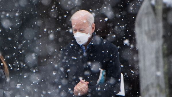 US President Joe Biden makes his way to his vehicle in the snow, after attending Mass at Saint Joseph on the Brandywine Church in Wilmington, Delaware on February 7, 2021. President Joe Biden anticipates the US rivalry with China will take the form of "extreme competition" rather than conflict between the two world powers. Biden said in a CBS interview aired Sunday that he has not spoken with Chinese counterpart Xi Jinping since he became US president.  MANDEL NGAN / AFP