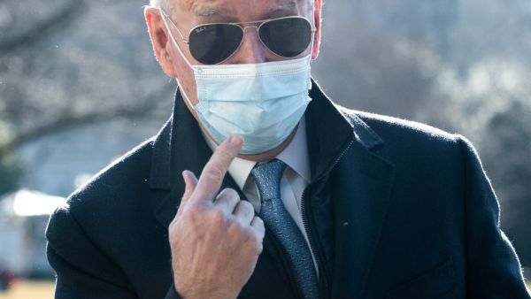 US President Joe Biden walks from Marine One after arriving on the South Lawn of the White House in Washington, DC, February 8, 2021, following a weekend in Delaware. SAUL LOEB / AFP