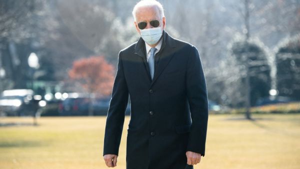 US President Joe Biden walks from Marine One after arriving on the South Lawn of the White House in Washington, DC, February 8, 2021, following a weekend in Delaware. SAUL LOEB / AFP