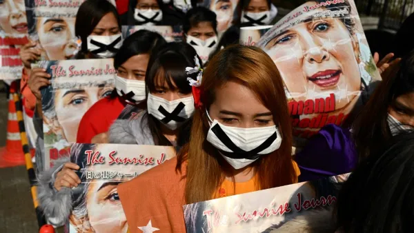 Activists take part in a protest against the military coup in Myanmar in Tokyo on February 14, 2021. CHARLY TRIBALLEAU / AFP