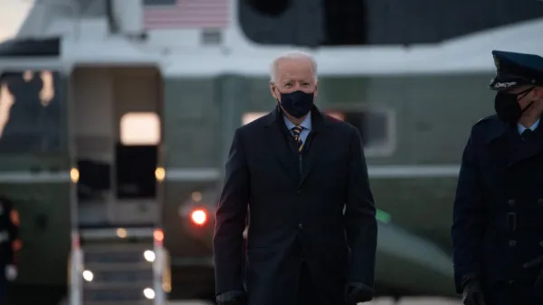 US President Joe Biden makes his way to board Air Force One prior to departure from Joint Base Andrews in Maryland, February 16, 2021, as he travels to Milwaukee, Wisconsin, for a town hall. SAUL LOEB / AFP