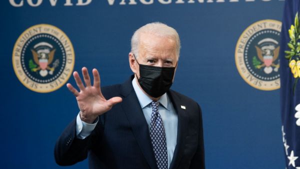 US President Joe Biden leaves after speaking about the 50 million doses of the Covid-19 vaccineshot administered in the US during an event commemorating the milestone in the Eisenhower Executive Office Building in Washington, DC, February 25, 2021. SAUL LOEB / AFP