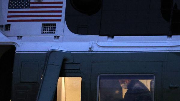 U.S. President Joe Biden is seen aboard Marine One as he departs from the South Lawn of the White House February 12, 2021 in Washington, DC. President Biden is spending his weekend at Camp David. Alex Wong/Getty Images/AFP ALEX WONG / GETTY IMAGES NORTH AMERICA / Getty Images via AFP