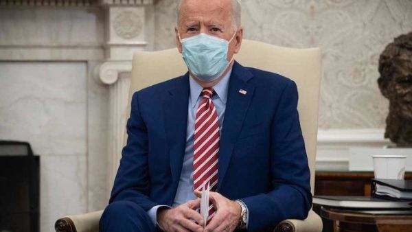 US President Joe Biden holds a meeting with US Senators about infrastructure improvements in the Oval Office of the White House in Washington, DC, Feb. 11, 2021. (AFP)