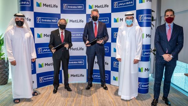 خلال الحدث بنك الإمارات دبي الوطني يوقع اتفاقية شراكة استراتيجية مع متلايف لتقديم حلول ومنتجات التأمين لعملائه