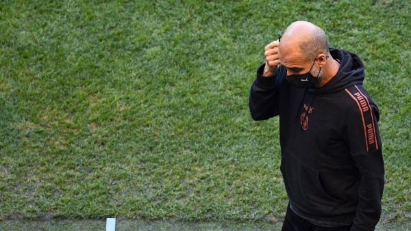 The manager is worried that allowing players to travel around the world will increase risk of coronavirus spreading at clubs (Photo: AFP)