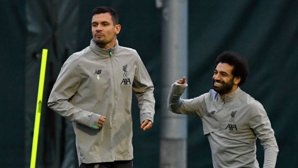 The Egyptian forward has generated exit rumours at Anfield, but a former team-mate and close friend can see him sticking around (Photo: AFP)