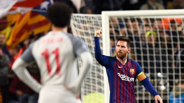 The Bundesliga giants' CEO thinks the Egyptian icon is comparable to the Barcelona star in terms of his accomplishments on the pitch (Photo: AFP)