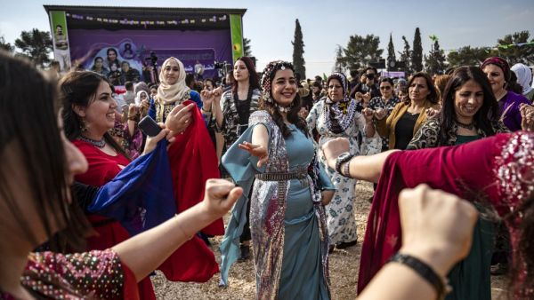 Kurdish Syrian women take part in Women's Day celebration in the Syria's northeastern city of Qamishli