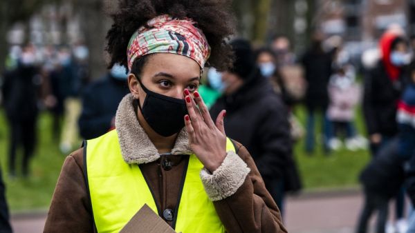 Demonstrators protest at a police station against racism in Rotterdam
