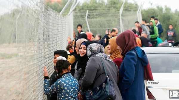 Palestinian women watching football 