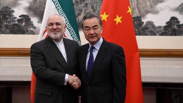 Zarif and Wang Yi: A good handshake 