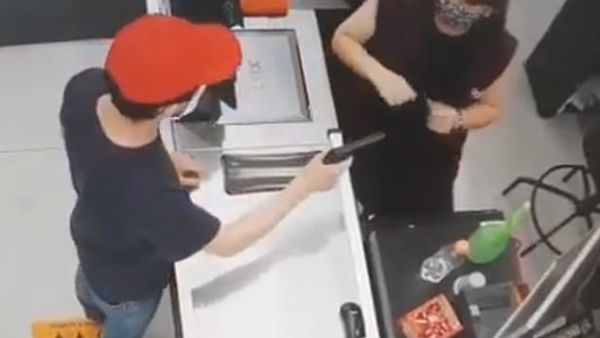 Priest uses a fake gun to rob a supermarket