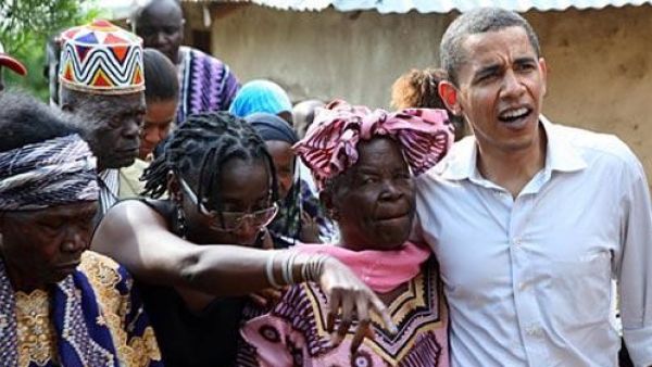 The then Senator Barack Obama holds his step-grandmother Sarah Hussein Onyango Obama