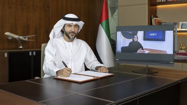 Mohammad Al Bulooki, Etihad Aviation Group COO and Hanan Al Yafei Hub71 CEO sign MOU Etihad Airways And Hub71 Sign MoU To Boost Global Tech Ecosystem In Abu Dhabi