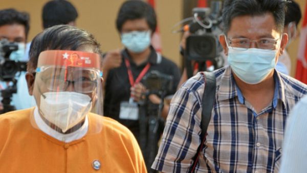 Aung Thura (R) before his abduction