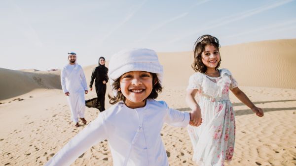 A happy family on a desert picnic