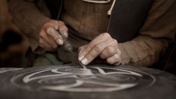 Craftsman working on stone 