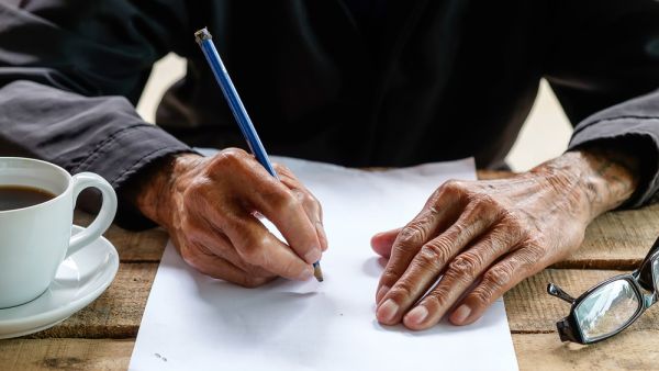 Old man with a pencil