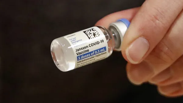 Nurse Florisa N. Lingad holds a Johnson & Johnson Janssen Covid-19 vaccine at a vaccination center established at the Hilton Chicago O'Hare Airport Hotel in Chicago, Illinois.