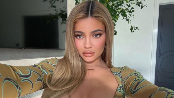 the 23-year-old makeup mogul posed up a storm in her edgy ensemble 