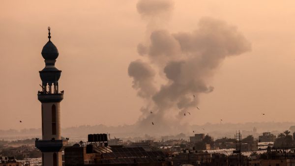 A fire billows from Israeli air strikes in Khan Yunis, in the southern Gaza Strip 
