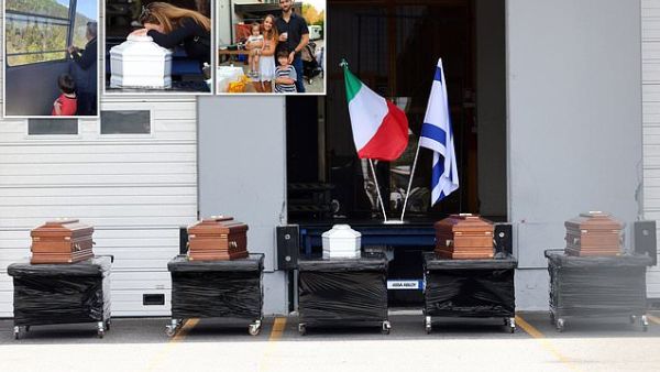 Coffins of the Five Israeli Family Members Killed in the Italian Cable Car Lined up Ahead of Their Repatriation