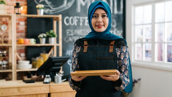 female muslim cafe worker 