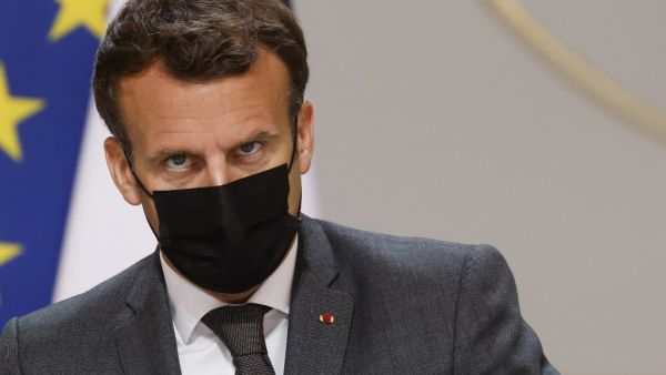 French President Emmanuel Macron attends, with members of the government, the weekly cabinet meeting at the Salle des Fetes, at the Elysee presidential palace in Paris, on June 9, 2021, for the first time since Covid-19 restrictions came into effect in October 2020. 
