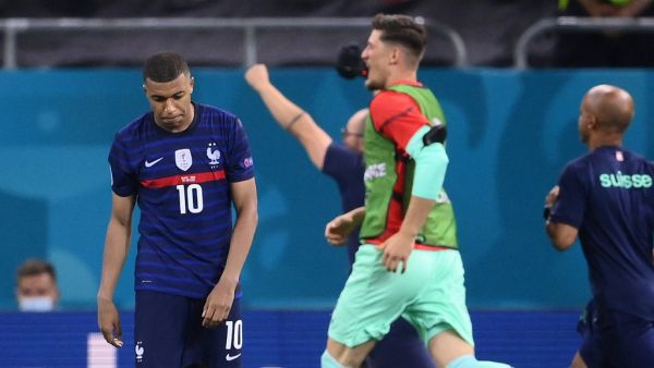 France's forward Kylian Mbappe (L) reacts after missing the final penalty during the UEFA EURO 2020 round of 16 football match between France and Switzerland at the National Arena in Bucharest on June 28, 2021. (Photo: AFP)
