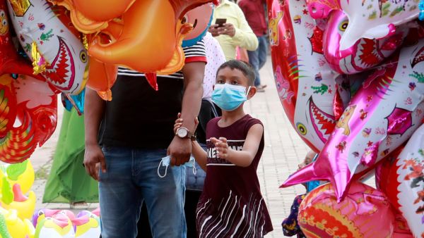 selling toy balloons on the streets 