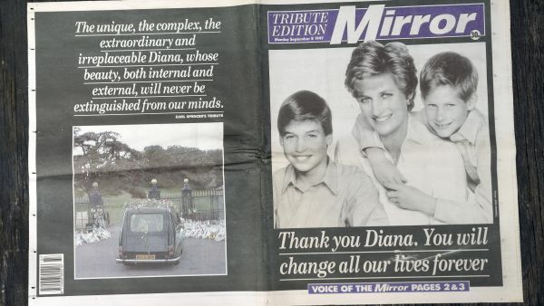 Mirror cover with Princess Diana, Prince William, and Prince Harry photograph