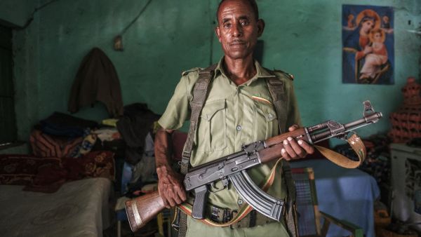 Mekonnen Nega, member of a peacekeeping unit of the Amhara militia in Dansha, holds his gun as he is portrayed in his home in the city of Dansha, Ethiopia, on July 10, 2021. EDUARDO SOTERAS / AFP Tigrayan rebel forces have launched a new offensive in the conflict-torn northern region of Ethiopia