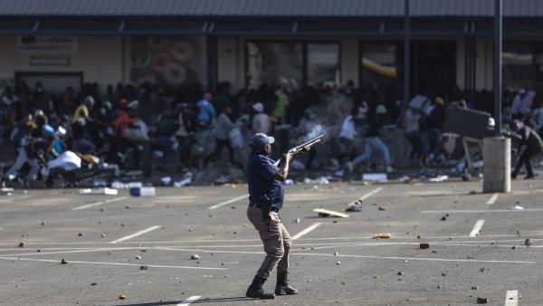 at least 10 killed in a stampede during mass looting in South Africa