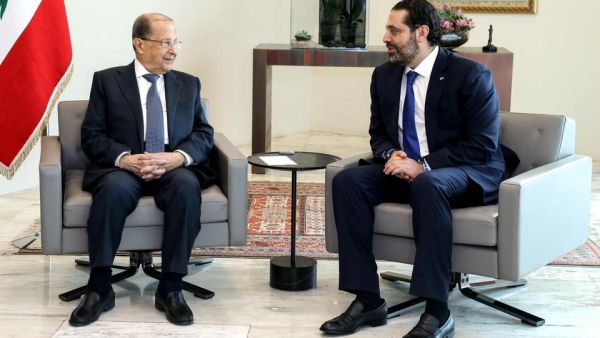 Aoun (Left), Hariri 